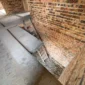 interior of unfinished brick house with concrete f 2024 12 06 02 56 55 utc 85x85